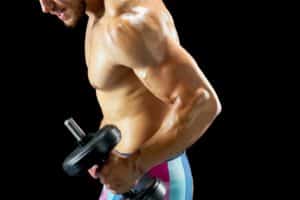 Lifting dumbbell to build muscles