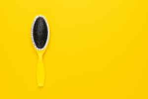 yellow massage comb